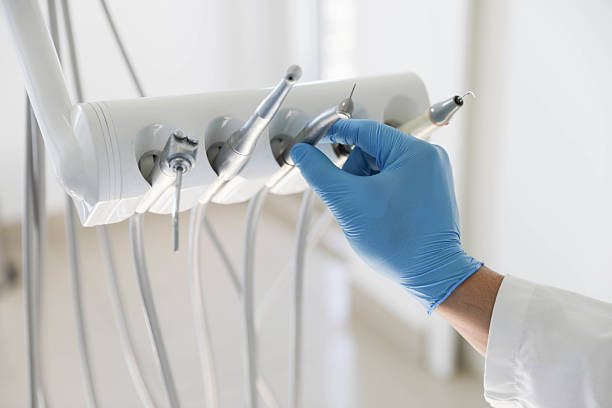 Professional Tooth Extraction technician working in Bowie, TX
